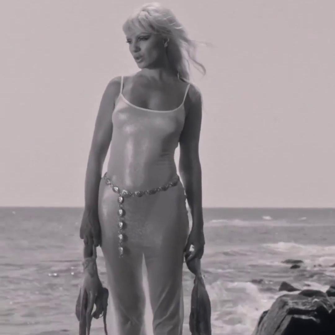 Alexandra Stan Poses Naked on the Beach