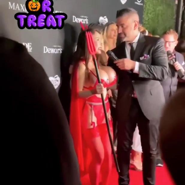 AsianBarbieDDoll Displays Her Enormous Fake Boobs at the 2021 Maxim Halloween Party