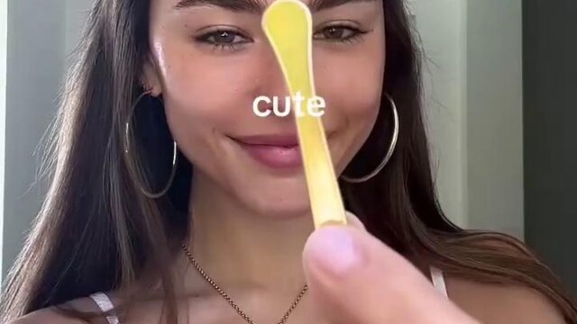 Madison Beer Displays Her Sexy Boobs in a White Top  Photos