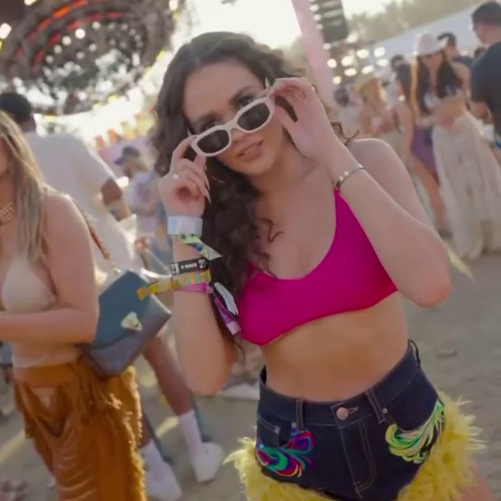 Madison Pettis Steals the Show at  Revolve Fest and Flauns Braless Rack and Killer Stems